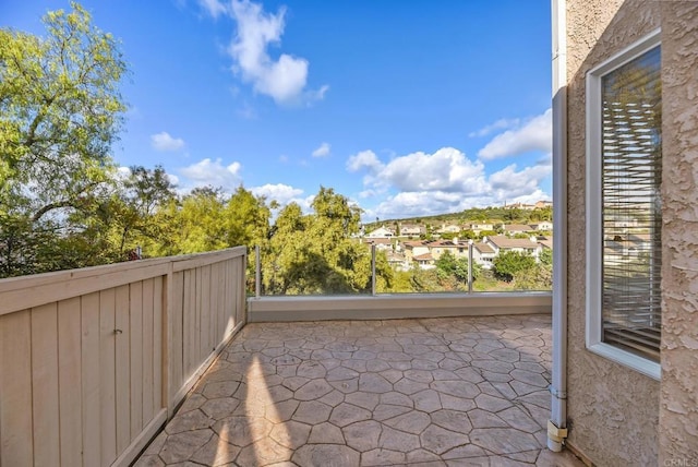 view of patio with a balcony