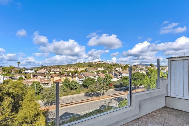 balcony featuring a residential view
