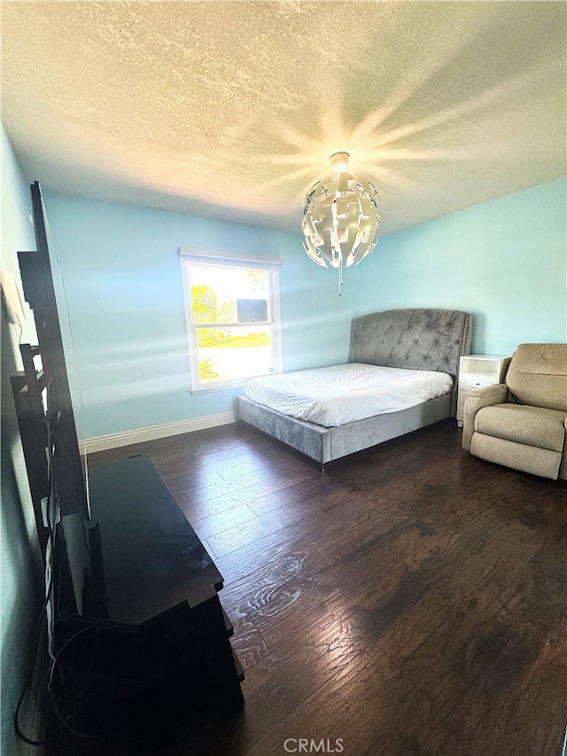 234 Santa Rosa Rd, Arcadia, CA 91007 - bedroom with a notable chandelier, hardwood / wood-style floors, baseboards, and a textured ceiling