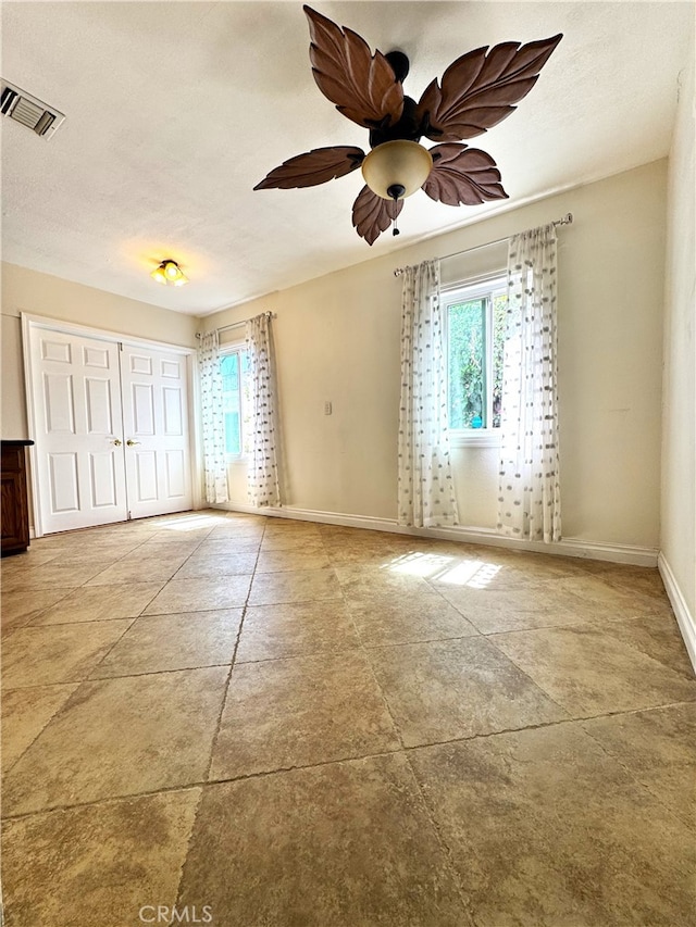 234 Santa Rosa Rd, Arcadia, CA 91007 - empty room featuring a textured ceiling, baseboards, visible vents, and a wealth of natural light