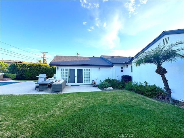 234 Santa Rosa Rd, Arcadia, CA 91007 - rear view of house with an outdoor living space, a yard, stucco siding, a patio area, and french doors