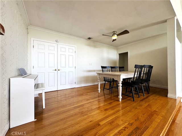234 Santa Rosa Rd, Arcadia, CA 91007 - dining space featuring visible vents, baseboards, ornamental molding, a ceiling fan, and wood finished floors