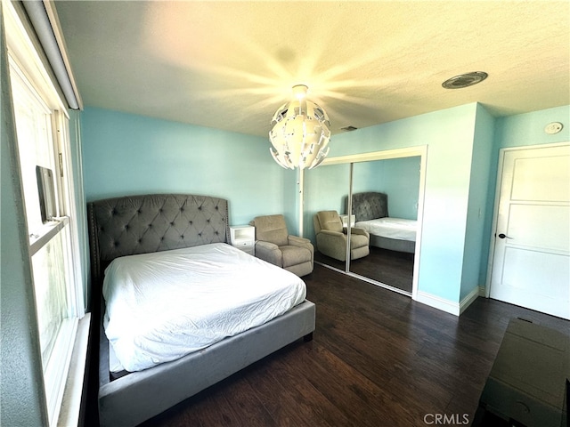 234 Santa Rosa Rd, Arcadia, CA 91007 - bedroom featuring a closet, baseboards, a chandelier, visible vents, and wood finished floors
