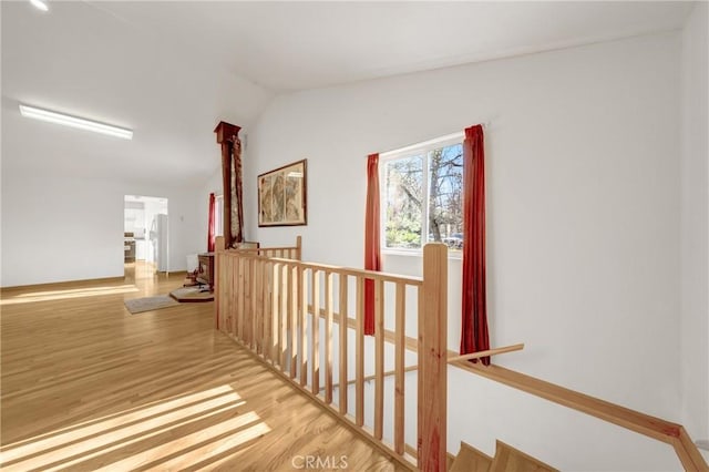 11575 Loch Lomond Rd, Middletown, CA 95461 - hall featuring an upstairs landing, wood finished floors, and lofted ceiling