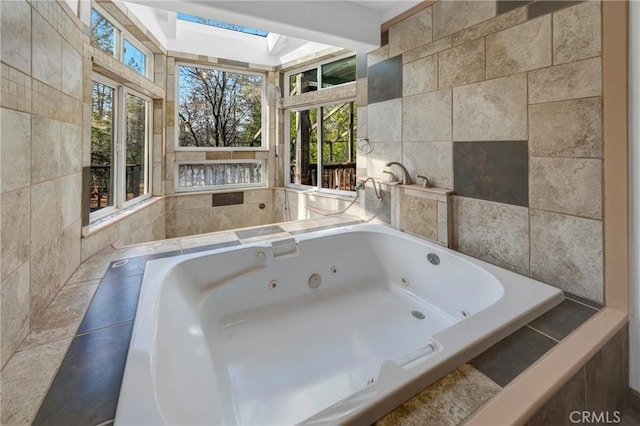 11575 Loch Lomond Rd, Middletown, CA 95461 - full bath with a skylight, tile walls, and a tub with jets