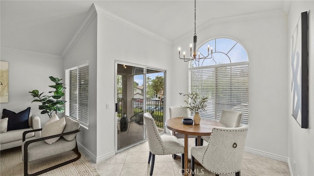 dining area with light tile patterned floors, baseboards, a notable chandelier, crown molding, and vaulted ceiling