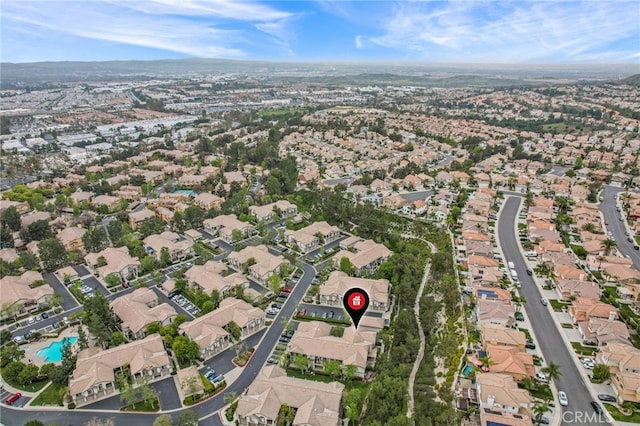 birds eye view of property with a residential view