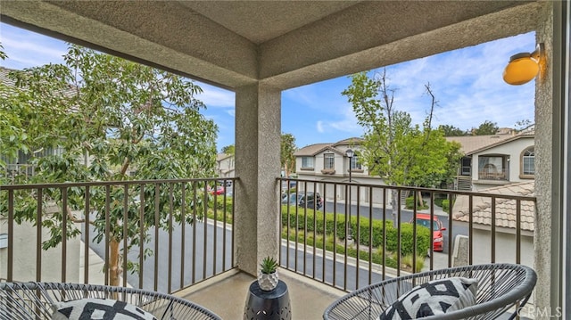 balcony featuring a residential view