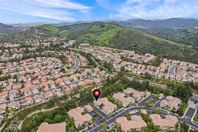 aerial view with a mountain view and a residential view