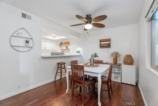 19132 Shoreline Ln Unit 6, Huntington Beach, CA 92648 - dining space featuring baseboards, dark wood-style floors, and ceiling fan