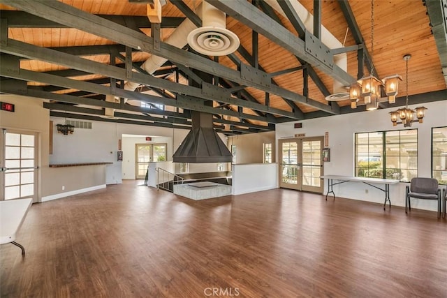 19132 Shoreline Ln Unit 6, Huntington Beach, CA 92648 - unfurnished living room featuring a chandelier, french doors, wood ceiling with exposed beams, wood finished floors, and high vaulted ceiling