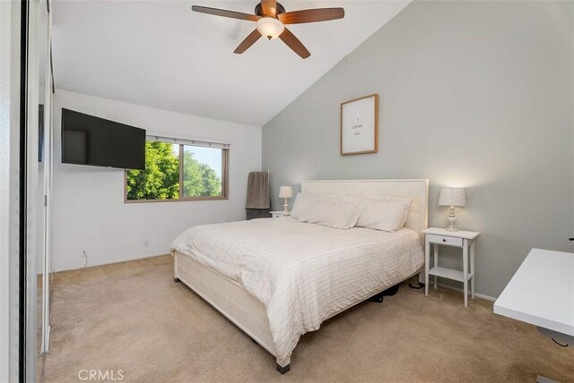 19132 Shoreline Ln Unit 6, Huntington Beach, CA 92648 - bedroom with light colored carpet, lofted ceiling, and ceiling fan