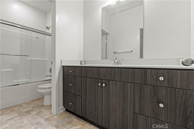 3069 Acebo Dr, Pomona, CA 91767 - bathroom featuring toilet, enclosed tub / shower combo, and vanity