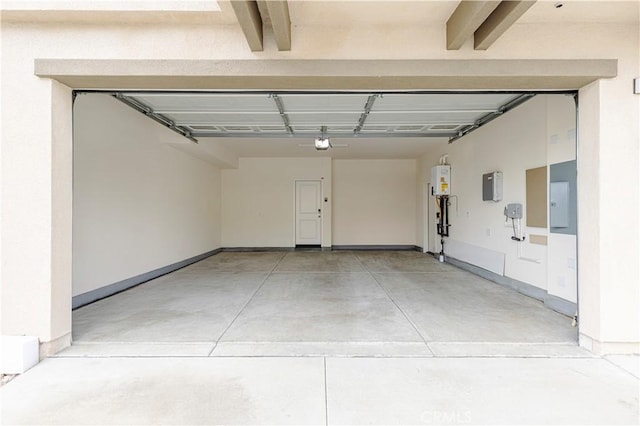 3069 Acebo Dr, Pomona, CA 91767 - garage with baseboards, a garage door opener, and water heater