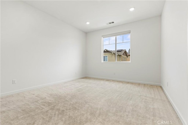 3069 Acebo Dr, Pomona, CA 91767 - empty room featuring light colored carpet, recessed lighting, baseboards, and visible vents