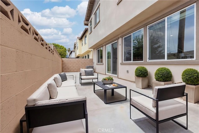 3069 Acebo Dr, Pomona, CA 91767 - view of patio featuring an outdoor hangout area and a fenced backyard