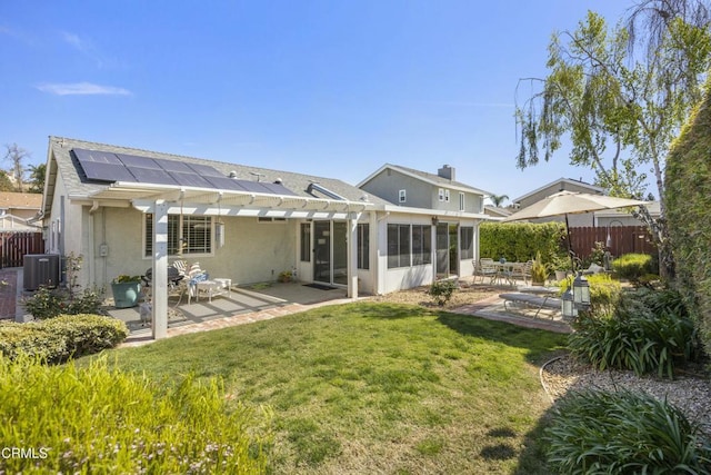 5216 Hillridge Dr, Camarillo, CA 93012 - rear view of property with a patio area, a pergola, stucco siding, a sunroom, and solar panels