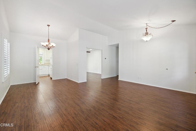 5216 Hillridge Dr, Camarillo, CA 93012 - unfurnished living room featuring a chandelier, lofted ceiling, and dark wood finished floors