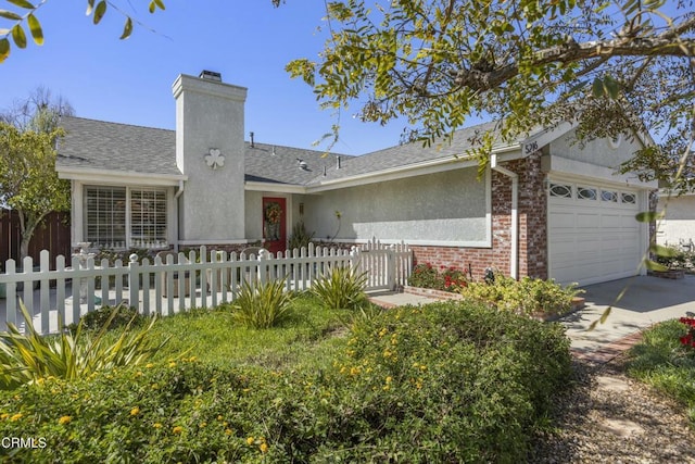 5216 Hillridge Dr, Camarillo, CA 93012 - single story home with a garage, brick siding, a chimney, a fenced front yard, and concrete driveway