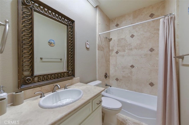 bathroom featuring toilet, vanity, and shower / bath combination with curtain