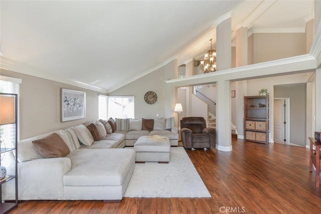 living area with dark wood-type flooring, crown molding, a notable chandelier, and stairway