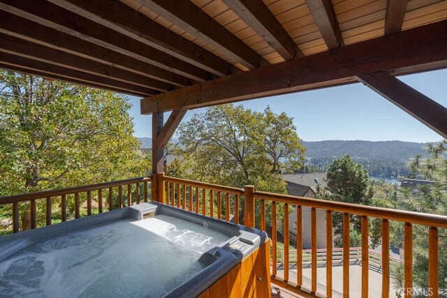 27721 Caribou Dr, Lake Arrowhead, CA 92352 - deck featuring a hot tub and a mountain view