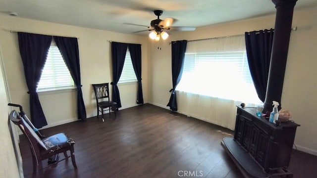 Palmdale, CA 93591 - living area featuring dark wood finished floors and ceiling fan