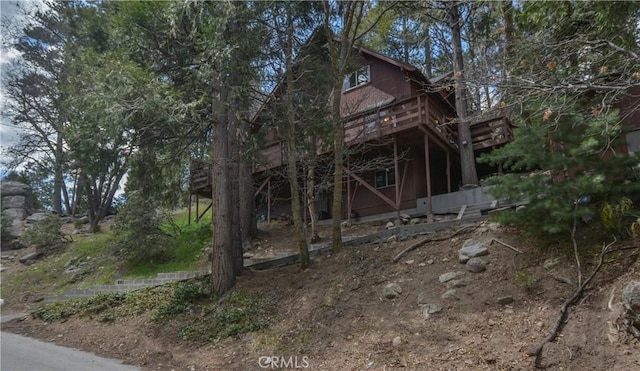 exterior space with a wooden deck