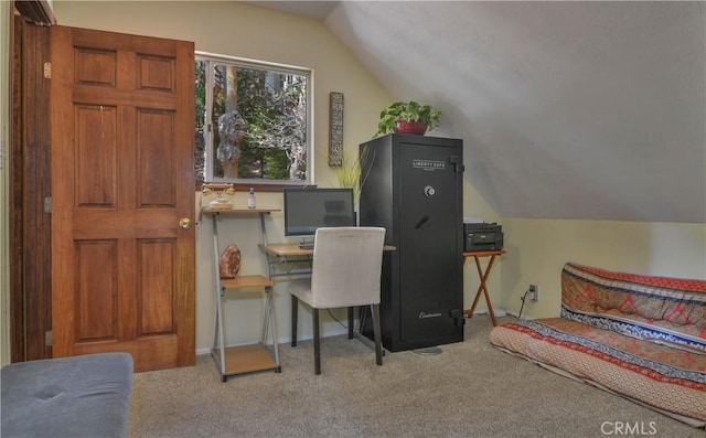 office featuring carpet floors, baseboards, and lofted ceiling