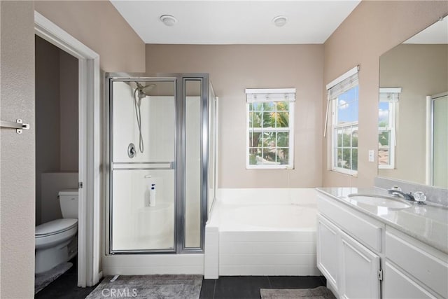 6050 Paseo Carreta, Carlsbad, CA 92009 - bathroom with tile patterned floors, toilet, a bath, and a stall shower