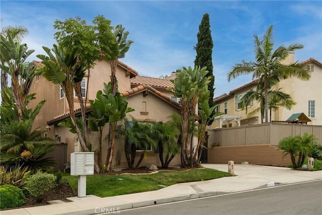6050 Paseo Carreta, Carlsbad, CA 92009 - mediterranean / spanish home featuring fence, stucco siding, and a tile roof