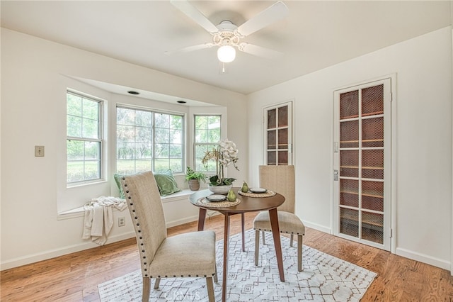 8029 Fruitland Ave, Winton, CA 95388 - dining space featuring light wood finished floors, baseboards, and a ceiling fan
