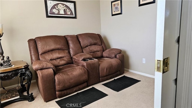 living room with baseboards and carpet floors