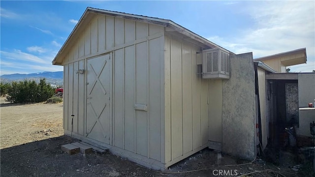 view of shed featuring a mountain view