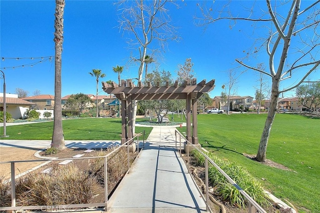 2925 E Via Terrano, Ontario, CA 91764 - view of property's community with a lawn, a residential view, and a pergola