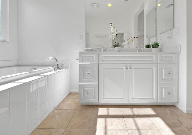 2925 E Via Terrano, Ontario, CA 91764 - full bath featuring tile patterned floors, double vanity, a bath, and baseboards