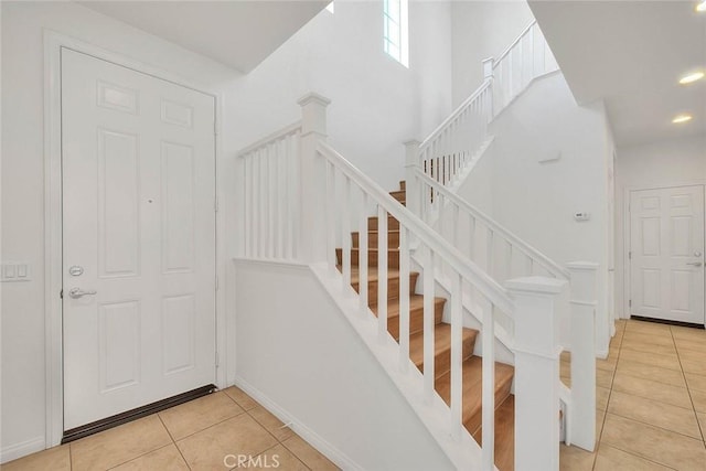 2925 E Via Terrano, Ontario, CA 91764 - stairs featuring tile patterned floors and recessed lighting
