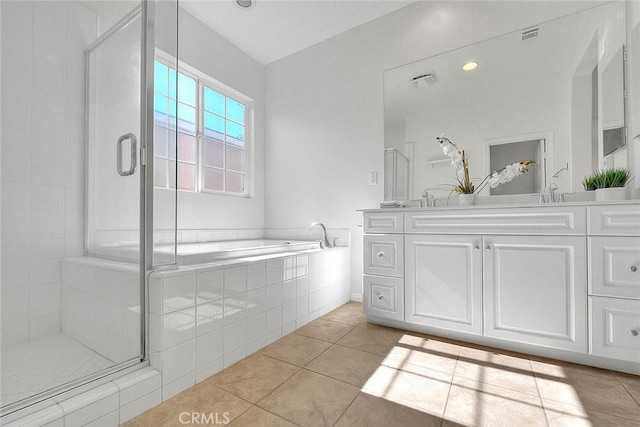 2925 E Via Terrano, Ontario, CA 91764 - bathroom with a stall shower, double vanity, tile patterned floors, and a bath