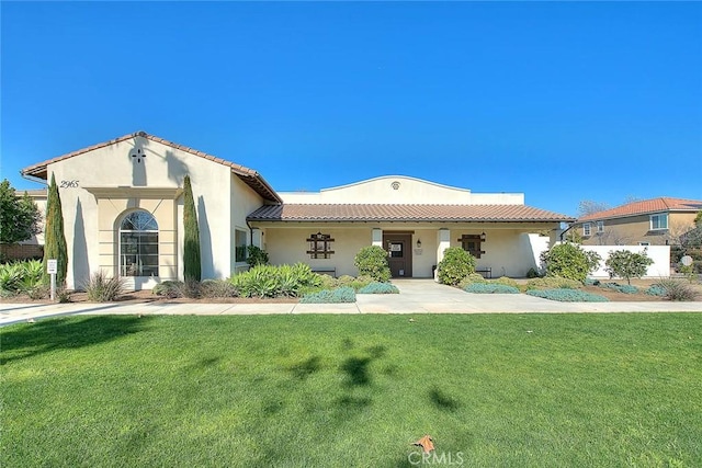 2925 E Via Terrano, Ontario, CA 91764 - mediterranean / spanish home with a front lawn and stucco siding