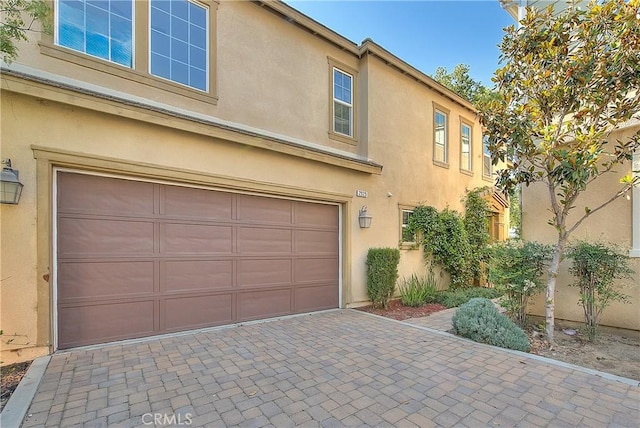 2925 E Via Terrano, Ontario, CA 91764 - garage featuring driveway