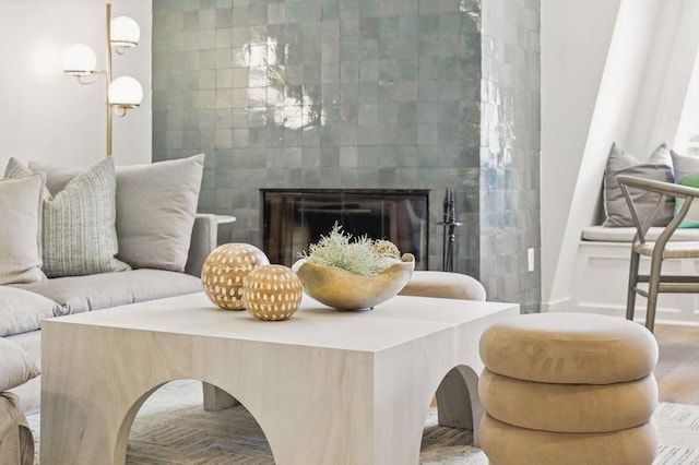 1562 Camino Del Mar Unit 639, Del Mar, CA 92014 - living room featuring wood finished floors and a fireplace