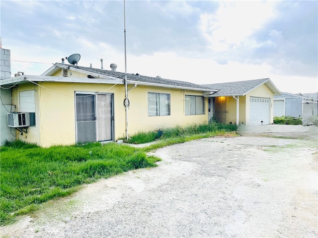 1380 Cottonwood Ave, San Jacinto, CA 92582 - single story home with driveway, stucco siding, and an attached garage