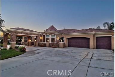 4069 Nancy Cir, Corona, CA 92881 - view of front of property featuring driveway and a garage