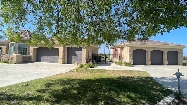 4069 Nancy Cir, Corona, CA 92881 - ranch-style house featuring a garage, stucco siding, a gate, concrete driveway, and stone siding