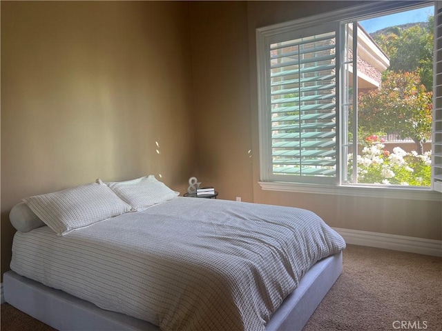 4069 Nancy Cir, Corona, CA 92881 - bedroom with carpet, multiple windows, and baseboards