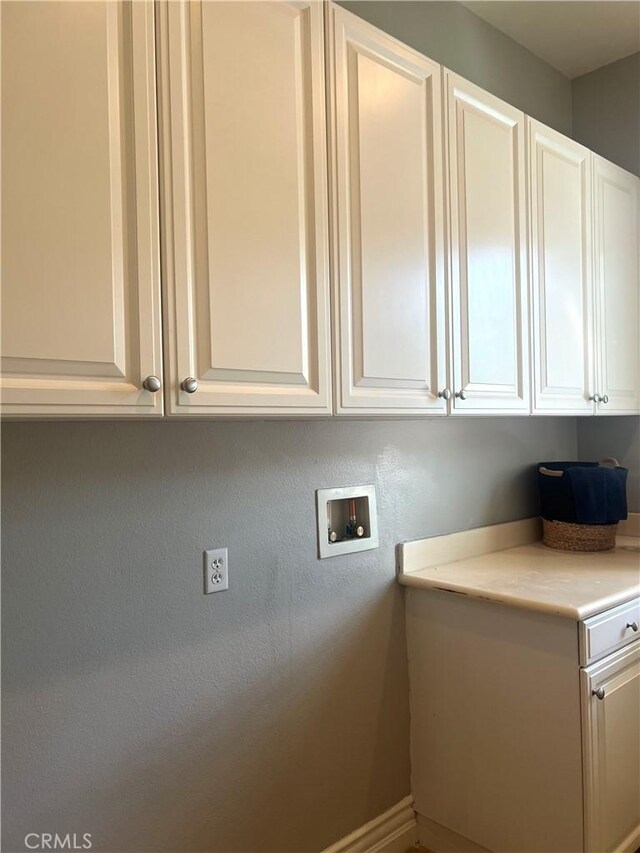 4069 Nancy Cir, Corona, CA 92881 - laundry room featuring cabinet space and washer hookup