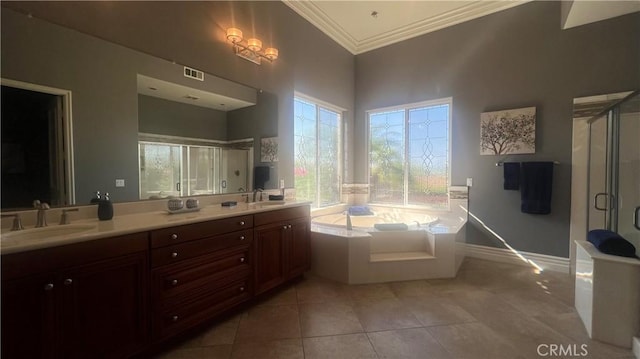 4069 Nancy Cir, Corona, CA 92881 - full bathroom featuring a shower stall, ornamental molding, a garden tub, double vanity, and tile patterned flooring