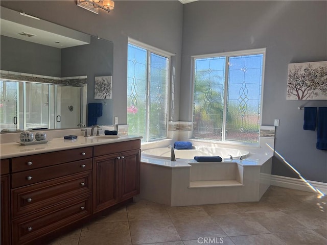 4069 Nancy Cir, Corona, CA 92881 - full bathroom featuring a bath, vanity, a stall shower, and tile patterned flooring