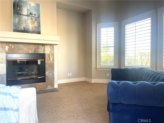 4069 Nancy Cir, Corona, CA 92881 - living room with carpet, baseboards, and a fireplace