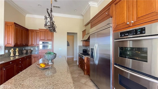 4069 Nancy Cir, Corona, CA 92881 - kitchen with stainless steel appliances, ornamental molding, light tile patterned floors, decorative backsplash, and light stone countertops